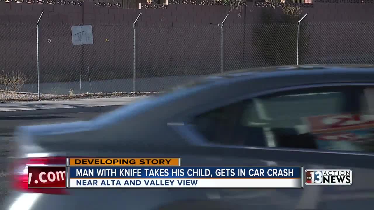 Las Vegas man with knife takes his child, gets in car crash