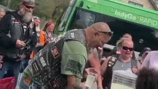 Bikers stop at a Lemonade stand