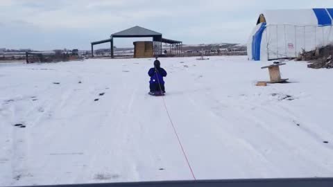 Winter knee boarding