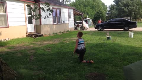 Little boy blue tank top back flip tree fail