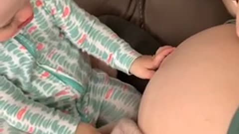 Sweet Toddler Preciously Kisses Mommy’s Pregnant Belly