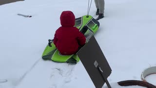 Cute baby Leo in the fresh Colorado snow