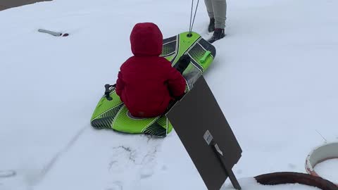 Cute baby Leo in the fresh Colorado snow