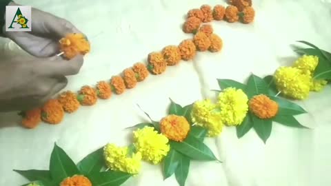 Beautiful Toran with mango leaves and marigold flowers