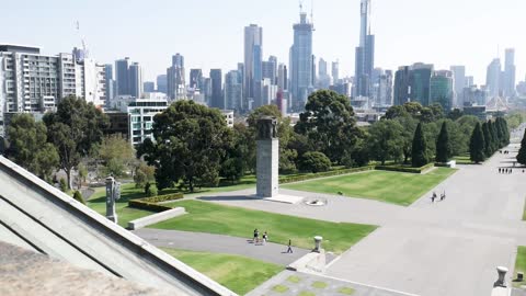 People Strolling In The City Park