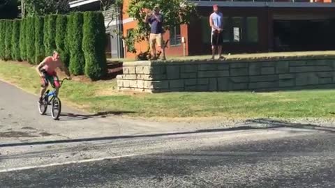 Guy bike speed down road runs into lake misses ramp