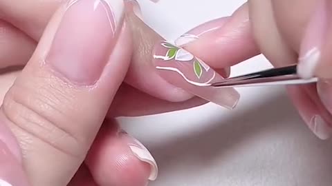 White and green petals manicure