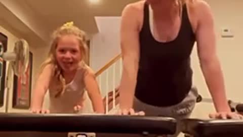 Mother and daughter workout together