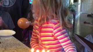 Little Girl Tries To Blow Out Birthday Candles, Lights Her Hair On Fire