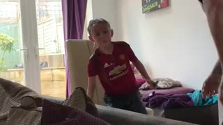 Dad Surprises Son with Hidden Water Balloon Gag