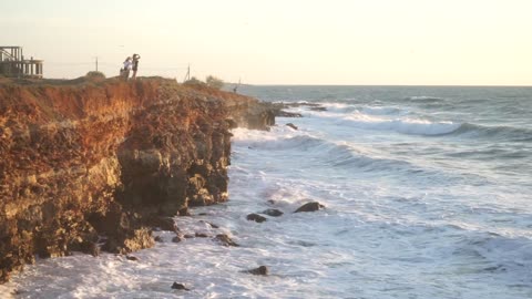 waves and sunset