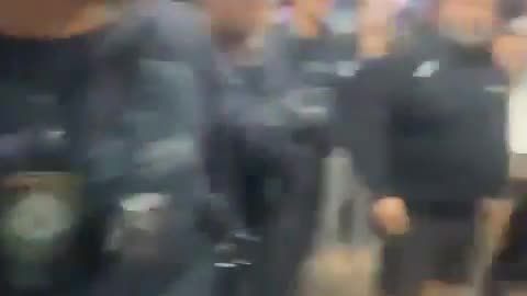 Crowds try to get the Islamic terrorist following the attack on Bishop Mar Mari