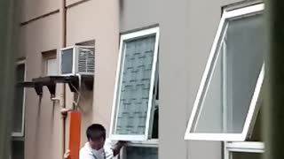 Staff Scale Building to Rescue Dog