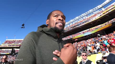 Kevin Durant On Super Bowl Sidelines As Photographer