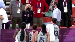 Macron, Jill Biden fist bump at Tokyo Olympics