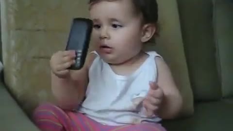 Baby makes a phone call