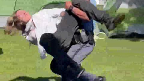 Georgia State Trooper (linebacker) tackles a Hamas agitator.