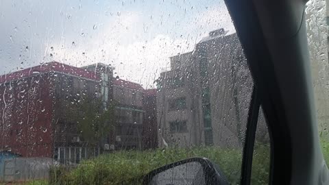 watching the rain in the car