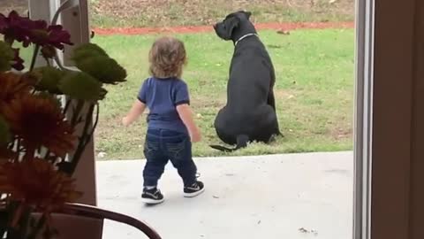 Mom catches toddler adorably walking out just to give dog a big hug