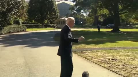 Weird Biden walk backwards away from press!