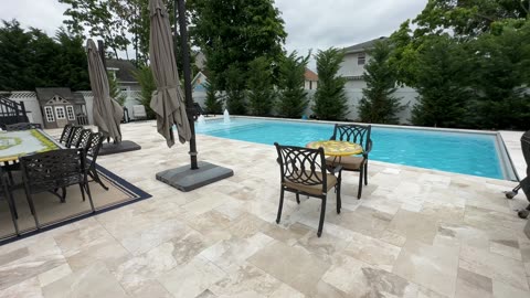 Swimming Pool with Marble Pavers, Sundeck and Water Bubblers | Bellmore NY