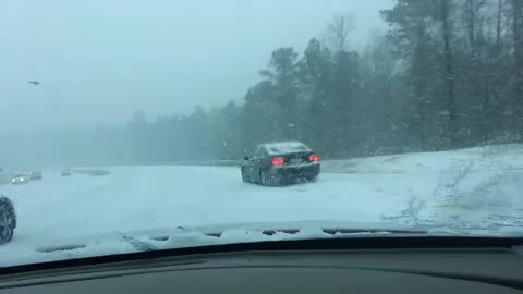 Car Struggles to Drive in Extreme snow.