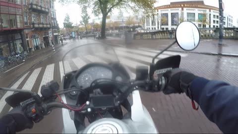 CRYPTO MOTORCYCLE DRIVE IN AMSTERDAM CENTRAL