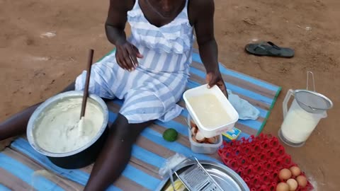 African Baking birthday cake in the village using sand__ Village celebrations_