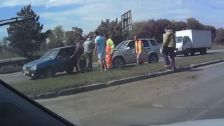 Car Crashes Across Median Into Another Vehicle