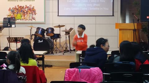 Adorable Child Loves To Sing And Dance At Church!