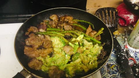 On my cooking show this is pork short ribs and asparagus and broccoli