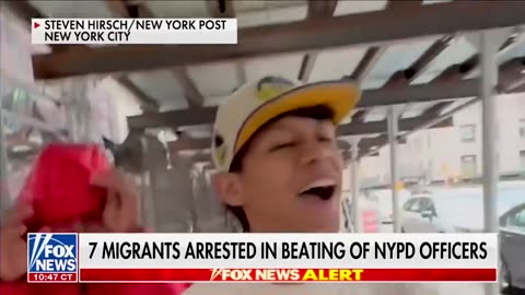 Illegal immigrants who attacked NYPD officers flipping off reporters after their release