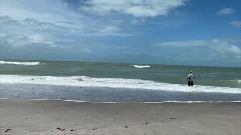 Shark tooth hunter ravaged by waves after tropical storm