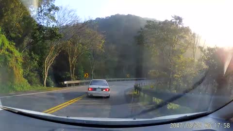 Swerving Car Nails Motorcyclist