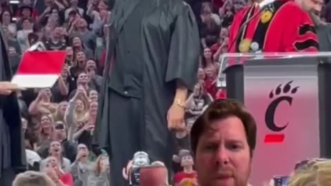 Travis Kelce chugs beer at graduation