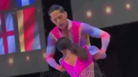Woman falls in dance contest, keeps smiling