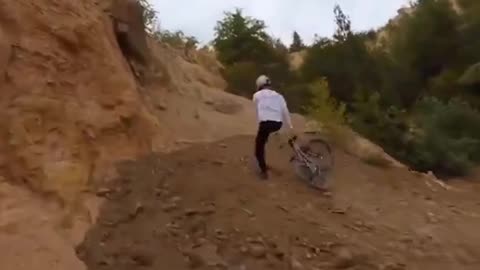 Mountain bike god doing his business