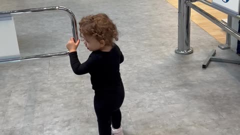 Toddler Loses Against Supermarket Mechanical Gate