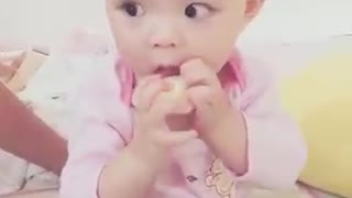 The feeling of baby eating yogurt