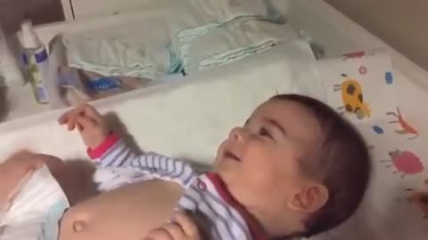 laughing with his dead dad changing diapers for his daughter