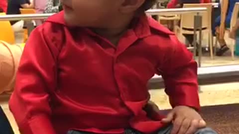 Cute kid teaching how to laugh