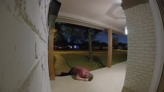 Guy red shirt falls on front porch