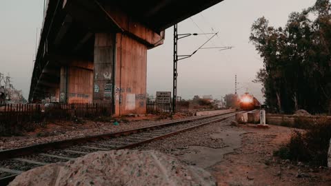 An Electric Train On The Railway Tracks