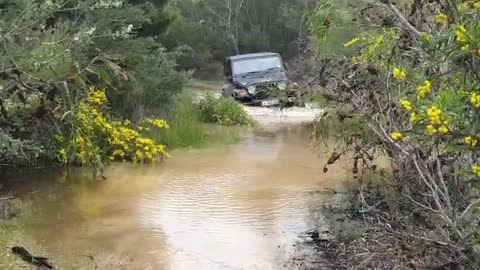 Jeep Wrangler 4x4ing through water