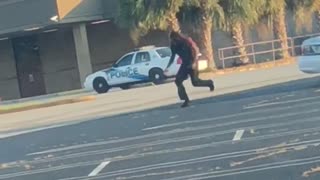 Police Car Crashes into Parked Car