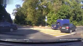 Biker lands on roof of car after doing a forward flip