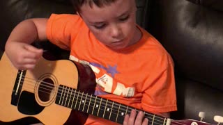 First Guitar and First song he learned.