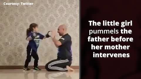 Little girl beats up her father to victory