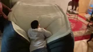 Girl Goes Flying When Brother Jumps on Air Mattress