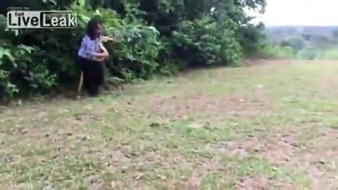 The woman tackles a 6 foot snake